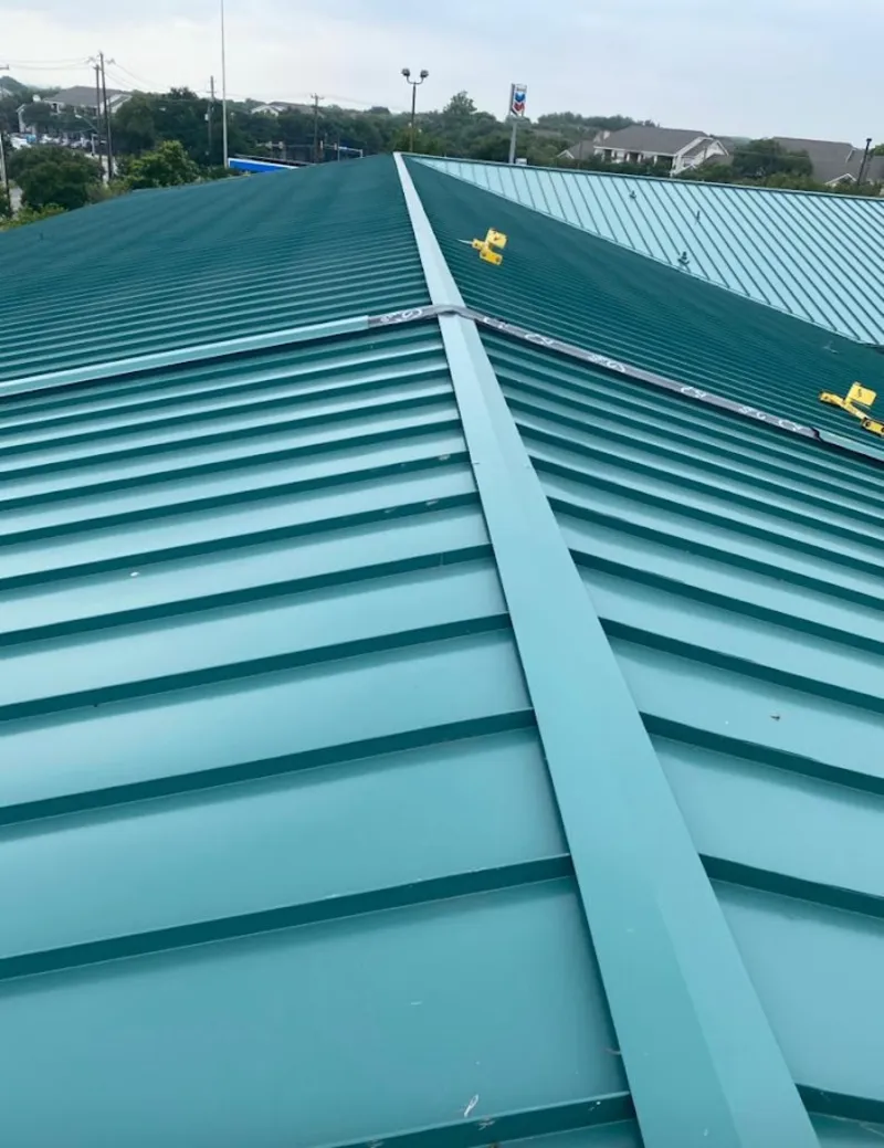 Green commercial metal roof ridge and valley for Metal Roof Repair in Fairview Park